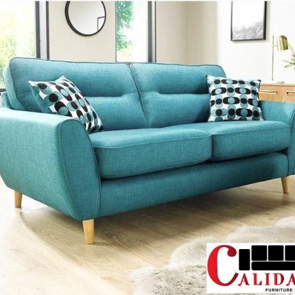 Shop the Atticus Fabric Sofa in Kenya—turquoise elegance, plush comfort, and a hardwood frame make it a stylish and cozy choice for any living room.